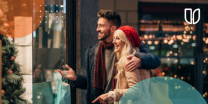 Couple doing their holiday shopping with UCU credit card.